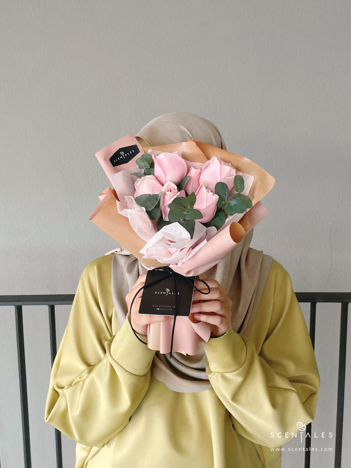 minimalist pink rose crepe pink bown flower bouquet