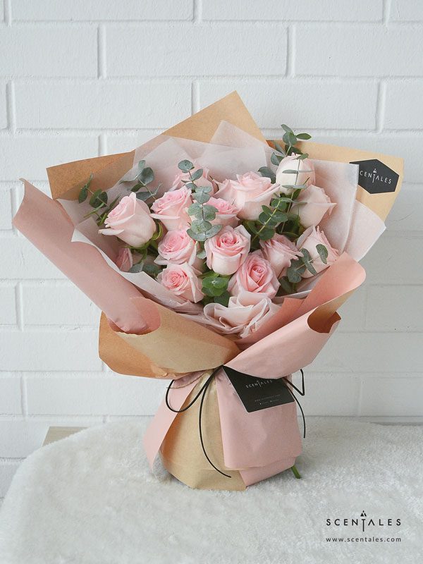 minimalist pink rose crepe pink bown flower bouquet
