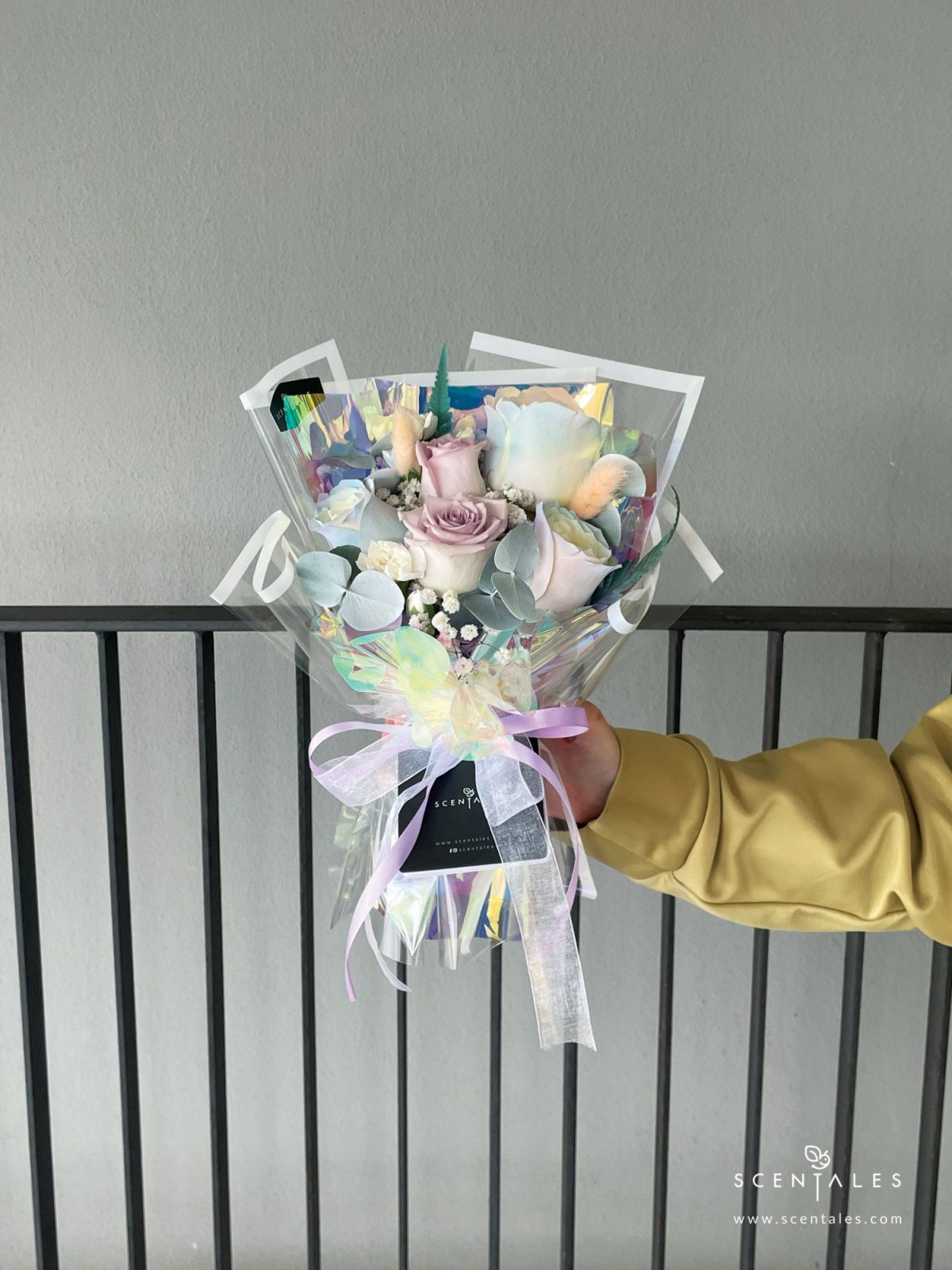 fresh flower bouquet with Pastel color rose, lilac rose, white spray carnation, dried bunny tail, plenty of baby’s breath, eucalyptus and paku leaves