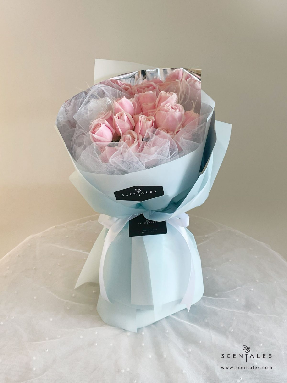 fresh flower with soft pink rose and plenty of stipa grass