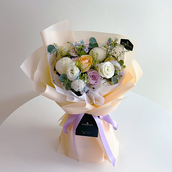 Champ Belle Fresh Flower Bouquet fresh flower bouquet with lilac rose, champagne rose, white eustoma, white ping pong, spray carnation x1, blue trachymene x1, blue oxypetalum, plenty of thlaspi and eucalyptus cinerea