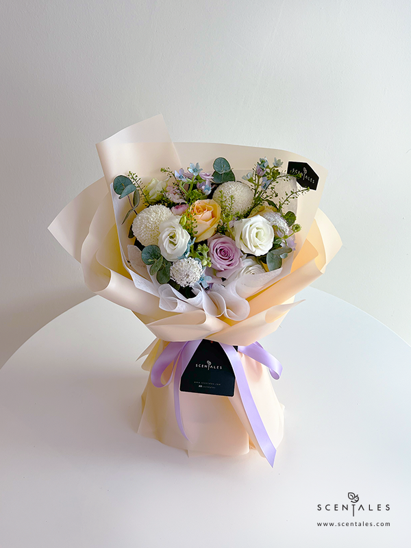 fresh flower bouquet with lilac rose, champagne rose, white eustoma, white ping pong, spray carnation x1, blue trachymene x1, blue oxypetalum, plenty of thlaspi and eucalyptus cinerea