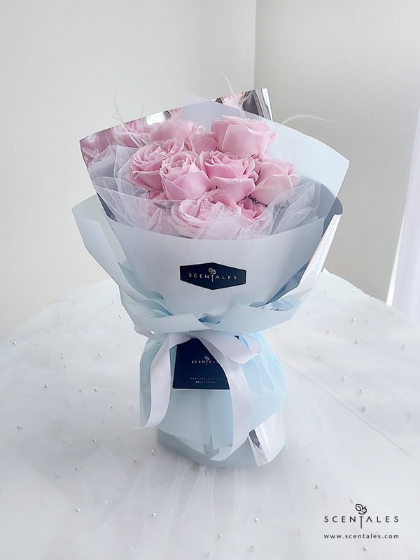 fresh flower with soft pink rose and plenty of stipa grass