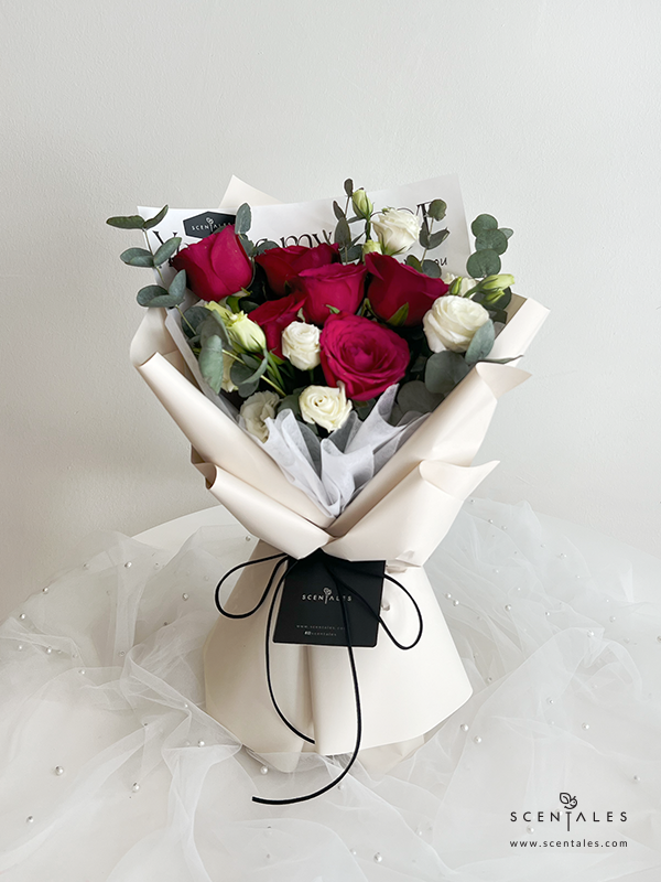 fresh flower with red rose, white eustoma and plenty of eucalyptus