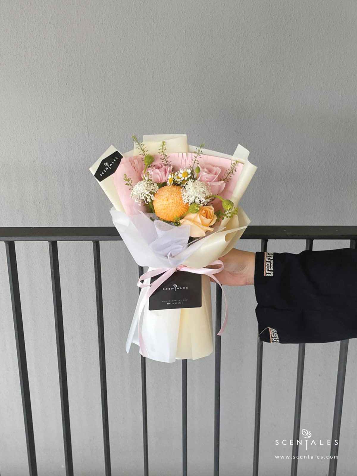 Fresh Flower bouquet with Champagne rose, pink rose, pink carnation, orange ping pong, chamomile, white trachymene buds, white eustoma and plenty of thlaspi