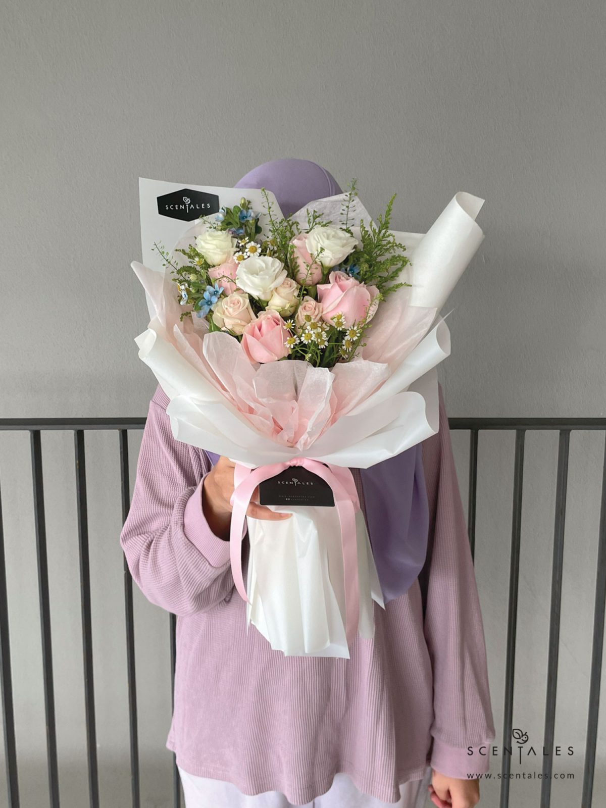 Fresh flower bouquet with Soft pink rose , champagne spray rose, white eustoma buds, blue oxypetalum, chamomile and plenty of thlaspi and yellow peacock