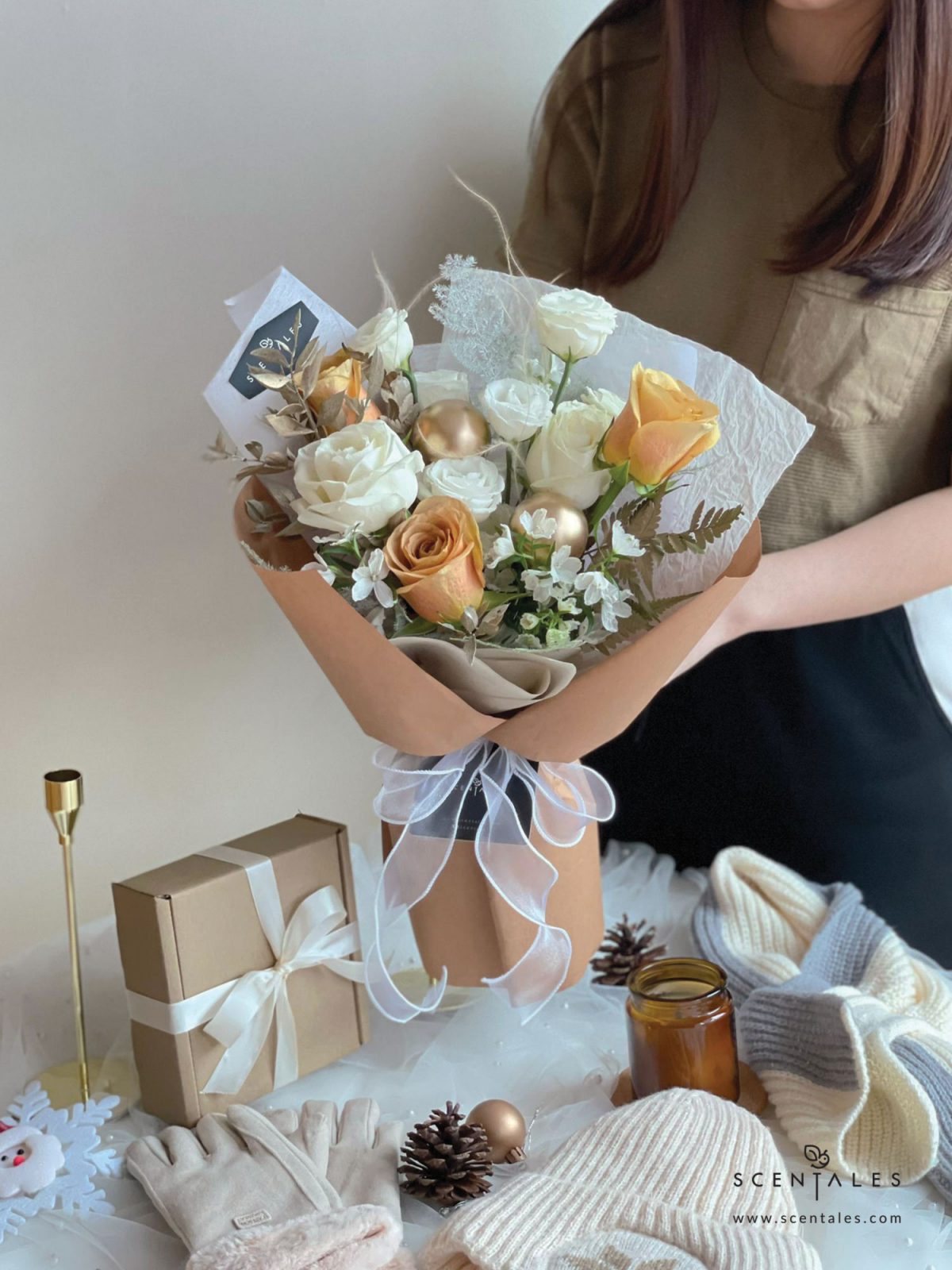 Fresh flower bouquet with Toffee rose, white rose, white eustoma buds, white mini delphinium, paku leaf, gold christmas ball and plenty of asparagus fern, stipa grass and preserved ruscus