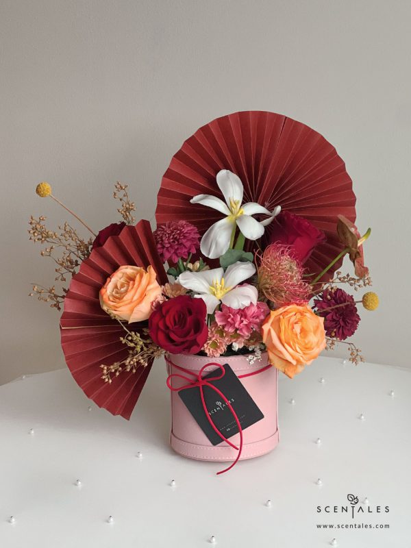 fresh flower with Orange rose, red rose, red leucospermum, white tulip, love of cuba carnation, maroon ping pong, anthurium, yellow craspedia, plenty of wolly ball, eucalyptus and rossi smokey calimero pom pom