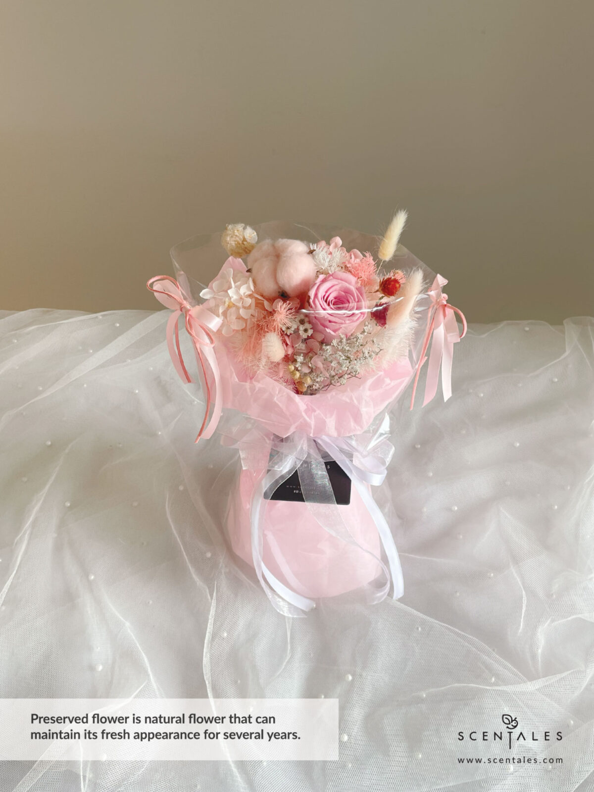 Dried and Preserved Bouquet with Preserved pink rose, pink cotton flower, red gomphrena, bunny tail, light yellow bunny tail, preserved white scabiosa stellata, happy flower, dried lino, plenty of preserved pink hydrangea, preserved pink asparagus, preserved white asparagus, dried white caspia and stipa grass