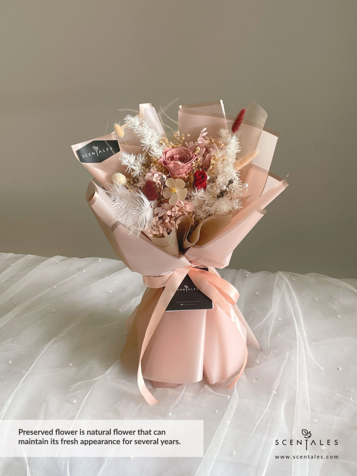 Dried and Preserved Bouquet with Preserved cappuccino rose, preserved red small rose, preserved white craspedia, lavendar, white violet flower, maroon bunny tail, white bunny tail, plenty of pink hydrangea, light brown hydrangea, preserved white asparagus, dried baby breath and preserved broom