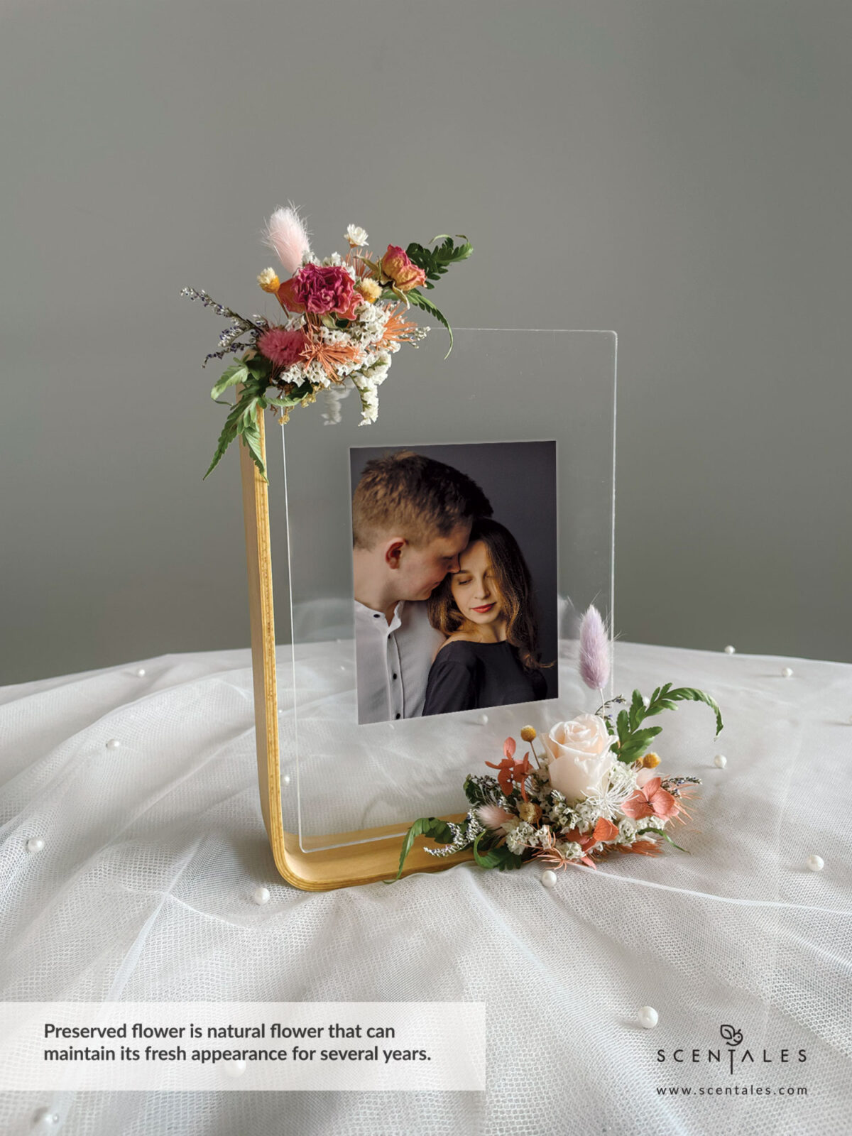 Dried and Preserved Bouquet with Preserved champagne small rose, purple bunny tail, pink bunny tail, dried pink spray rose buds, happy flower, a bit of preserved light brown hydrangea, preserved light brown asparagus, dried white caspia, dried blue caspia and dried paku leaves