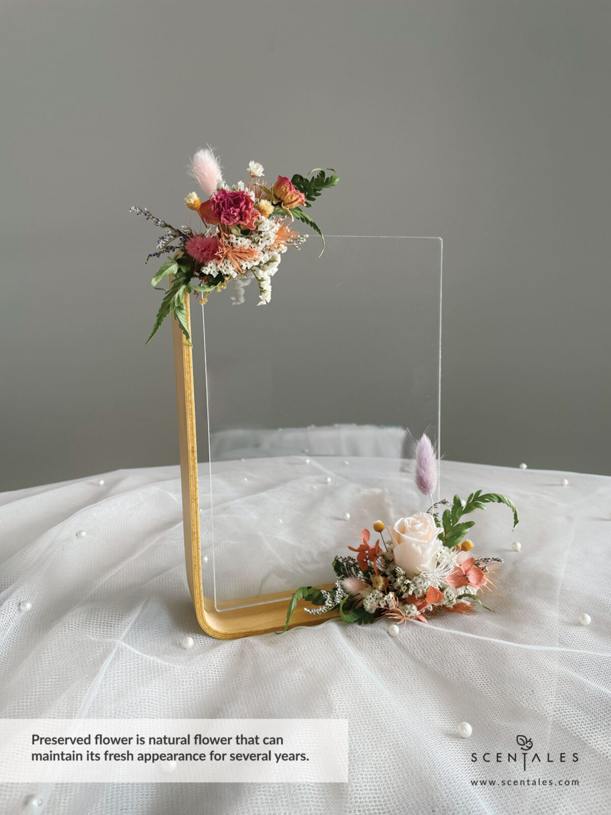 Dried and Preserved Bouquet with Preserved champagne small rose, purple bunny tail, pink bunny tail, dried pink spray rose buds, happy flower, a bit of preserved light brown hydrangea, preserved light brown asparagus, dried white caspia, dried blue caspia and dried paku leaves