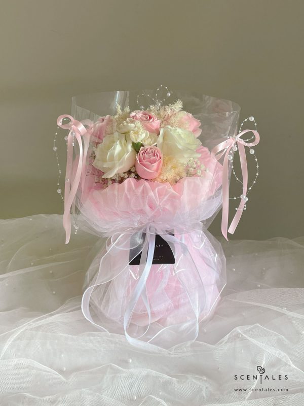 fresh flower bouquet with pink rose, white rose, white spray carnation, plenty of preserved white asparagus and white baby's breath