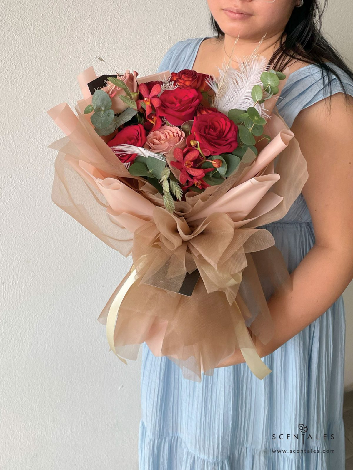 fresh flower bouquet with red rose, cappuccino rose, chocolate spray rose, dried brown pampas, red mokara orchid, preserved white asparagus, chasmanthium grass, white feather and plenty of eucalyptus cinerea