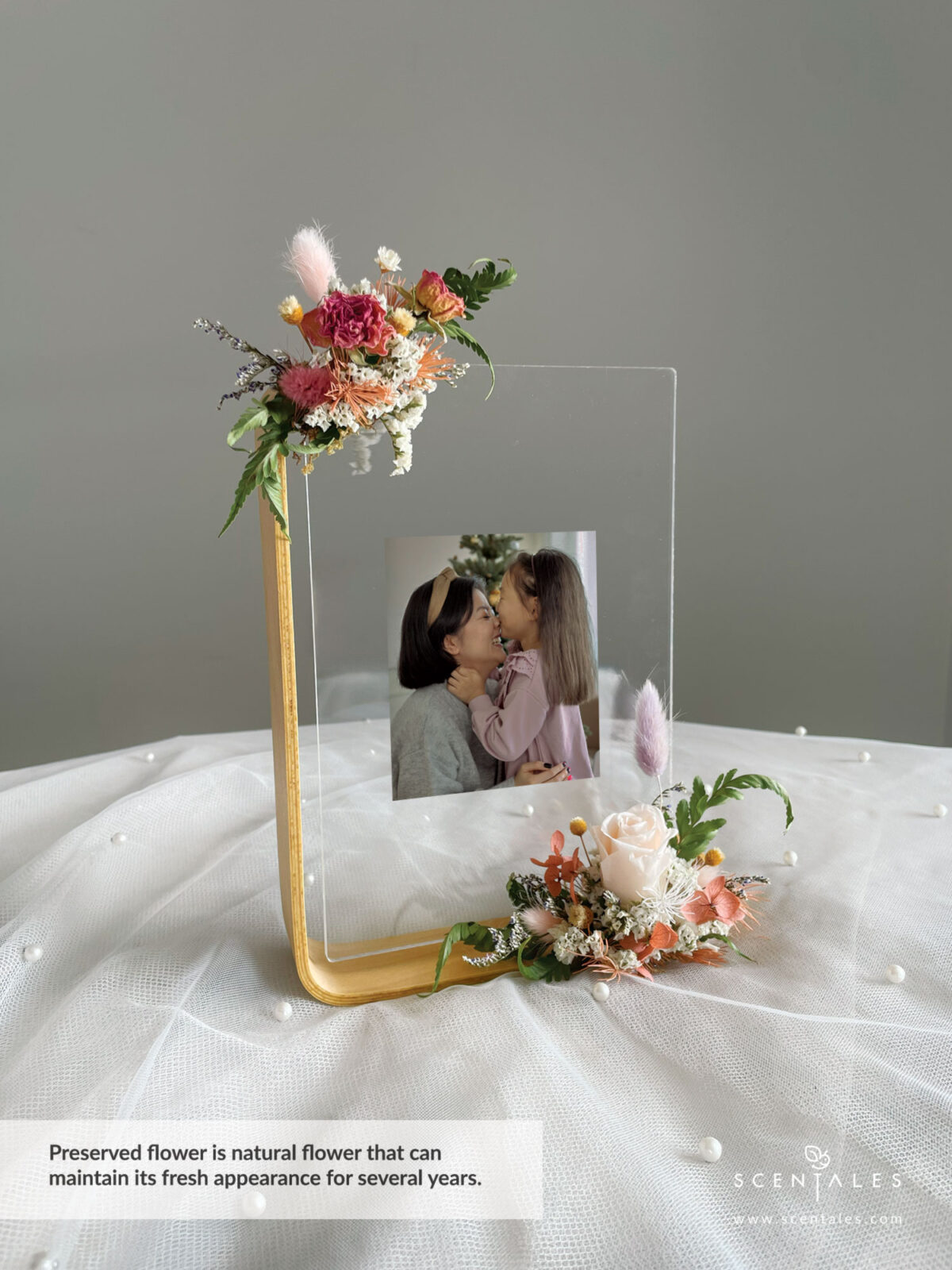 Dried and Preserved Bouquet with Preserved champagne small rose, purple bunny tail, pink bunny tail, dried pink spray rose buds, happy flower, a bit of preserved light brown hydrangea, preserved light brown asparagus, dried white caspia, dried blue caspia and dried paku leaves