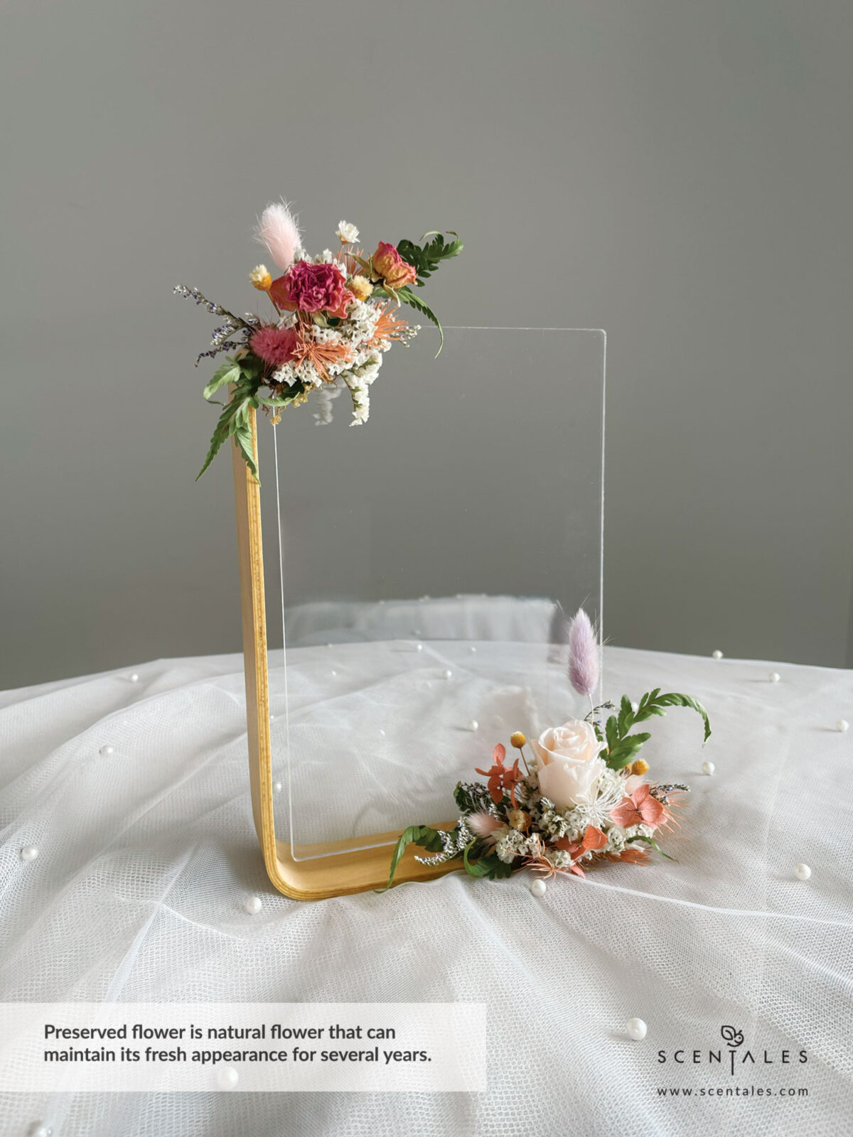 Dried and Preserved Bouquet with Preserved champagne small rose, purple bunny tail, pink bunny tail, dried pink spray rose buds, happy flower, a bit of preserved light brown hydrangea, preserved light brown asparagus, dried white caspia, dried blue caspia and dried paku leaves