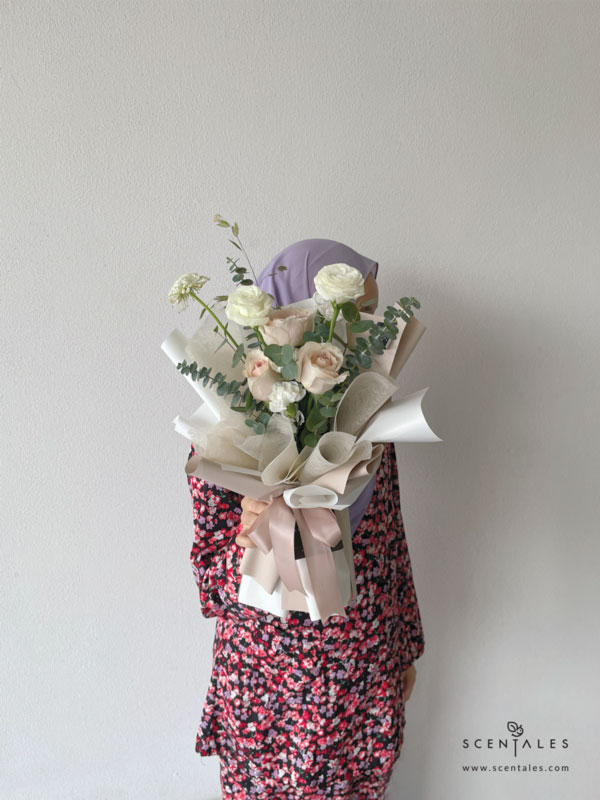 Fresh flower bouquet with Quicksand rose , white eustoma buds, trachymene , white spray carnation, chasmanthium grass and plenty of eucalyptus cinerea