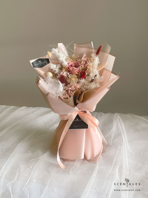 dried and preserved flower bouquet with preserved cappuccino rose, preserved red small rose, preserved white craspedia, lavendar, white violet flower, maroon bunny tail, white bunny tail, plenty of pink hydrangea, light brown hydrangea, preserved white asparagus, dried baby breath and preserved broom