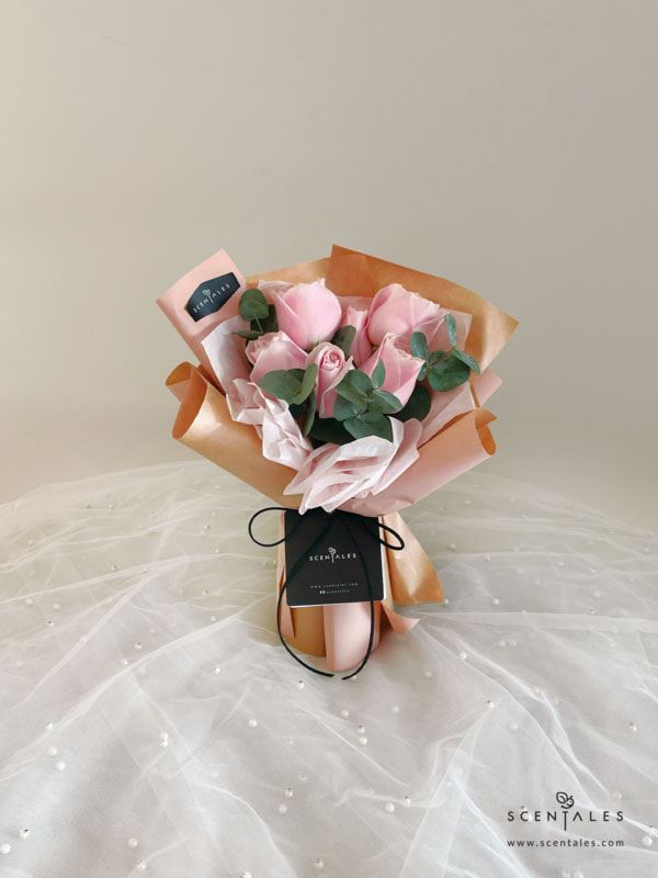 minimalist pink rose crepe pink bown flower bouquet