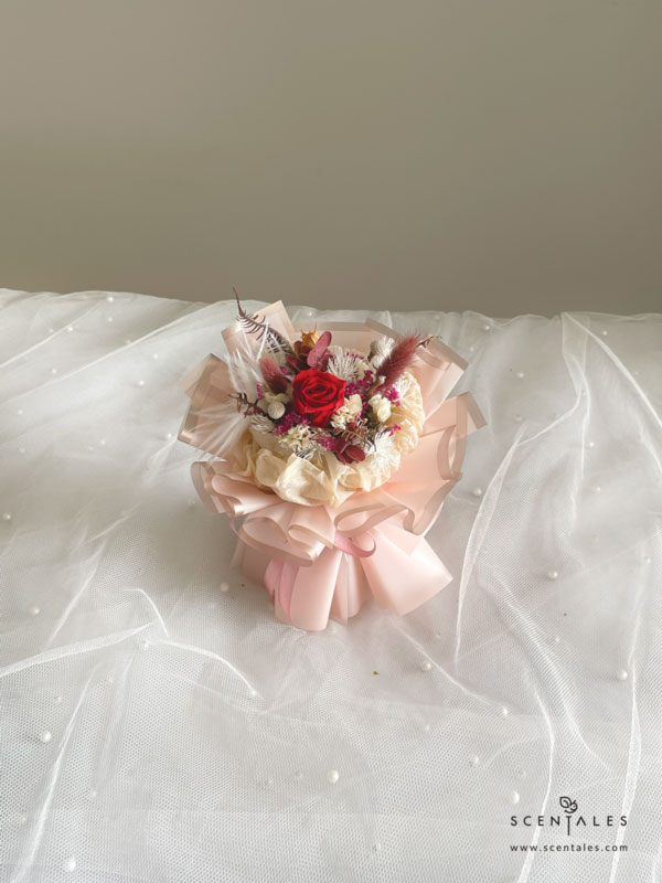 Dried and Preserved Bouquet with Preserved red small rose, maroon bunny tail, plenty of preserved maroon hydrangea, dried statice, dried fuchsia caspia, dried yamashita green leaves, preserved white asparagus and silver brunia