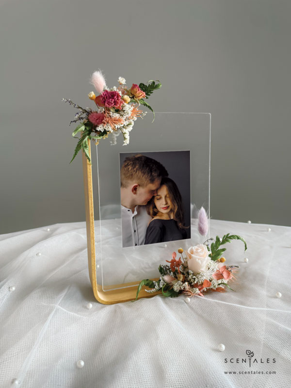 dried and preserved bouquet with preserved champagne small rose, purple bunny tail, pink bunny tail, dried pink spray rose buds, happy flower, a bit of preserved light brown hydrangea, preserved light brown asparagus, dried white caspia, dried blue caspia and dried paku leaves