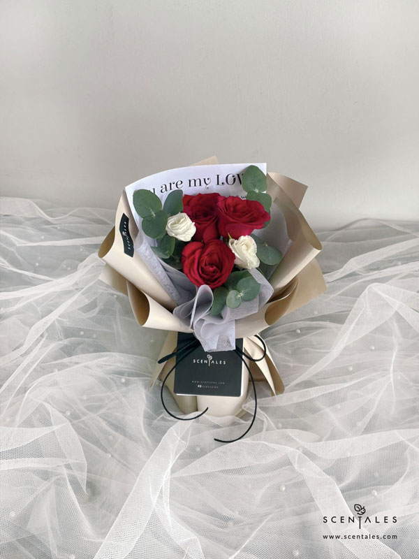 Scarlet Whisper Fresh Flower Bouquet Fresh flower bouquet with red rose, white eustoma and plenty of eucalyptus