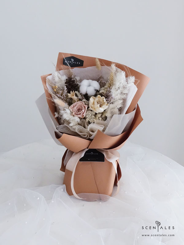 Erin Dried Flower Bouquet Dried flower bouquet with Preserved khaki rose, preserved solar peony, dried pine cone, white cotton flower, dried lino, brown pampas, a bit of stipa grass, plenty of dried pink caspia, dried white statice and preserved white asparagus