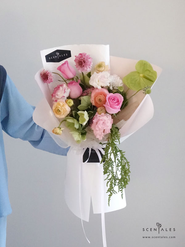 Muse de Lumière Flower Bouquet Fresh flower bouquet revival rose, apricot ranunculus, pink curly eustoma, green anthurium, pink scabiosa, green helleborus, pink rice flower, green tick and green amaranthus