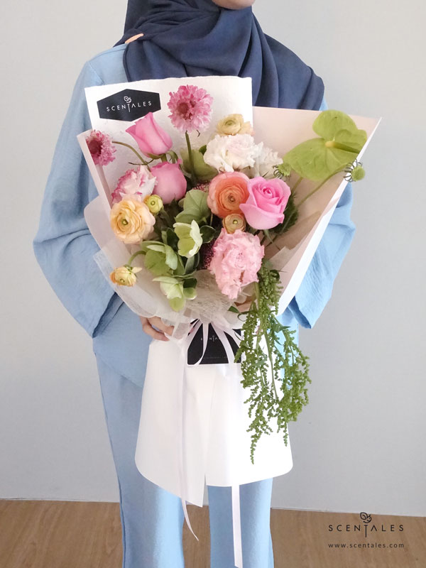 Muse de Lumière Flower Bouquet Fresh flower bouquet revival rose, apricot ranunculus, pink curly eustoma, green anthurium, pink scabiosa, green helleborus, pink rice flower, green tick and green amaranthus