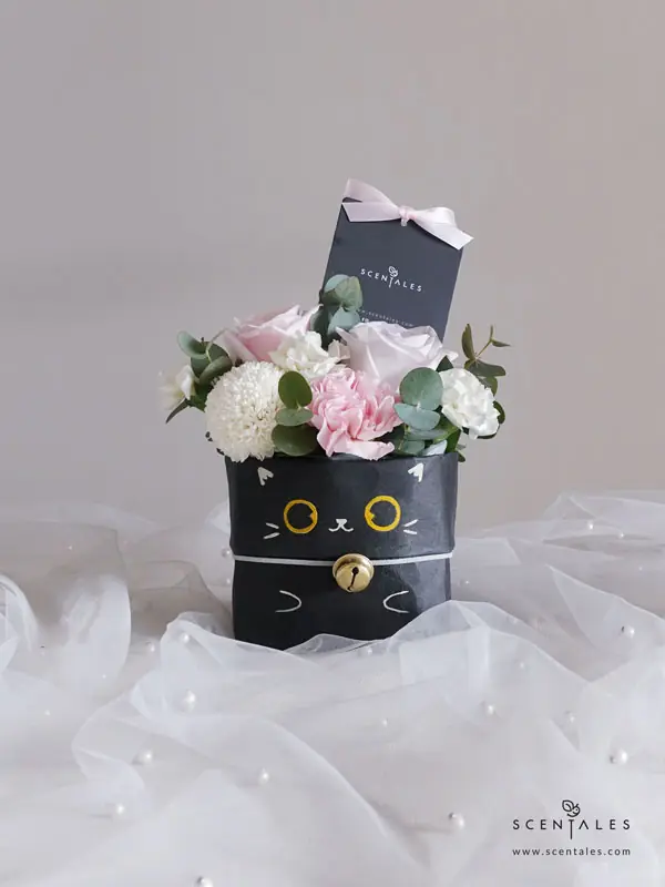 Niko The British Short Hair Kraft Bag Fresh flower kraft bag with Pink rose, lilac rose, pink carnation, white pingpong, white spray carnation and plenty of eucalyptus