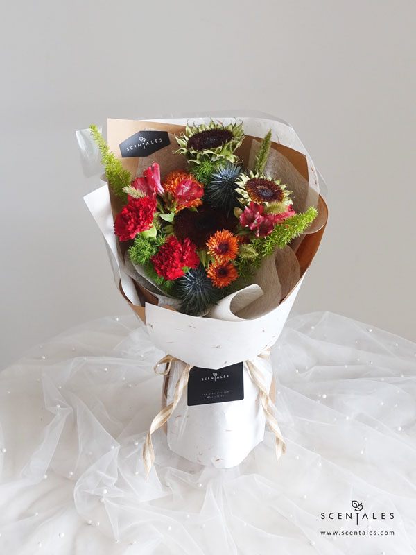 James Flower Bouquet Fresh flower bouquet with Sunflower, red alstroemeria, red carnation. blue eryngium, orange pompom, cat tail, fox tail and plenty of fish tail