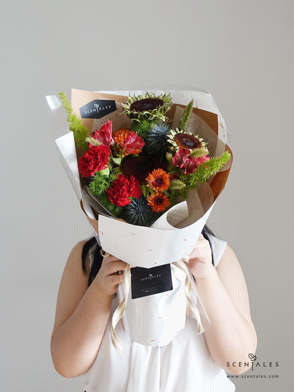 James Flower Bouquet Fresh flower bouquet with Sunflower, red alstroemeria, red carnation. blue eryngium, orange pompom, cat tail, fox tail and plenty of fish tail
